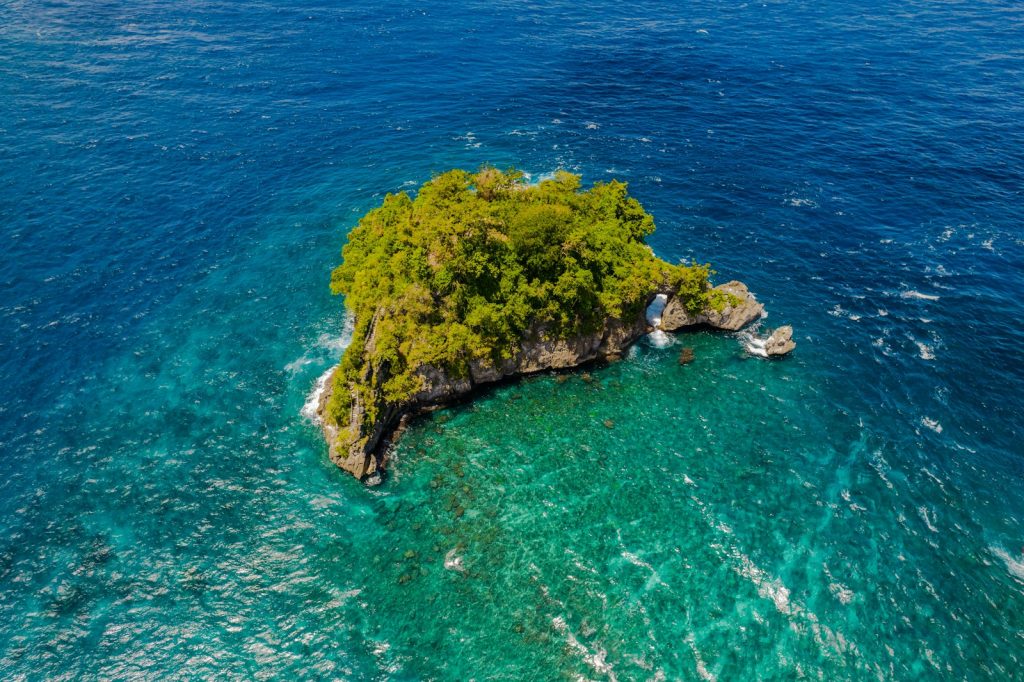 A small island in the middle of the ocean